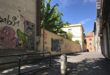 Lo streetartist LUOGOCOMUNE dipinge il muro di via Bellentanina