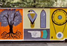 Il murale di via Bellentanina si arricchisce ancora: torna al lavoro lo street artist LuogoComune